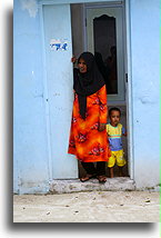 Muslim Lady with Boy::Mahibadhoo, Maldives::