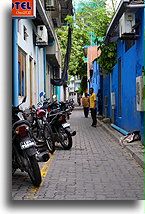 Motorcycles on Narrow Street::Male, capital city of Maldives::