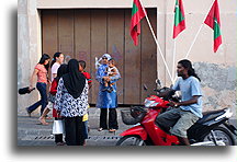 Pedestrians and Moped::Male, capital city of Maldives::