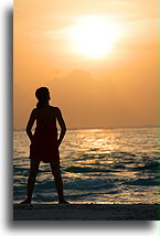 Woman`s Silhouette at Sunset::Rangali Island, Maldives::