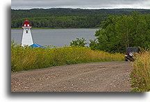 Short gravel road to Mabou Lighthouse::Cape Breton, Nova Scotia, Canada::