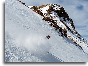 Skier in the Dust Cloud::Mammoth, CA, USA::