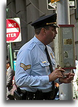 Officer with Cigar::New York City, USA::