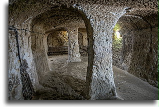 Columns in the tunnel::Derinkuyu Underground City, Cappadocia, Turkey::